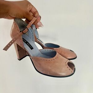 Vintage Nine West light pink peep toe pumps.